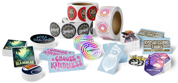 A collection of custom stickers laid out on a table.