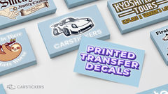 Group of printed transfer decals on table